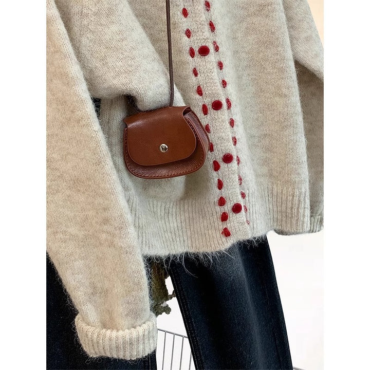 Pull en tricot douillet pour femmes avec détails de boutons colorés Chic & Stil