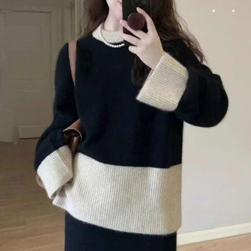 Cozy knitted sweater for women with a high collar and fine ribbed structure Amarae