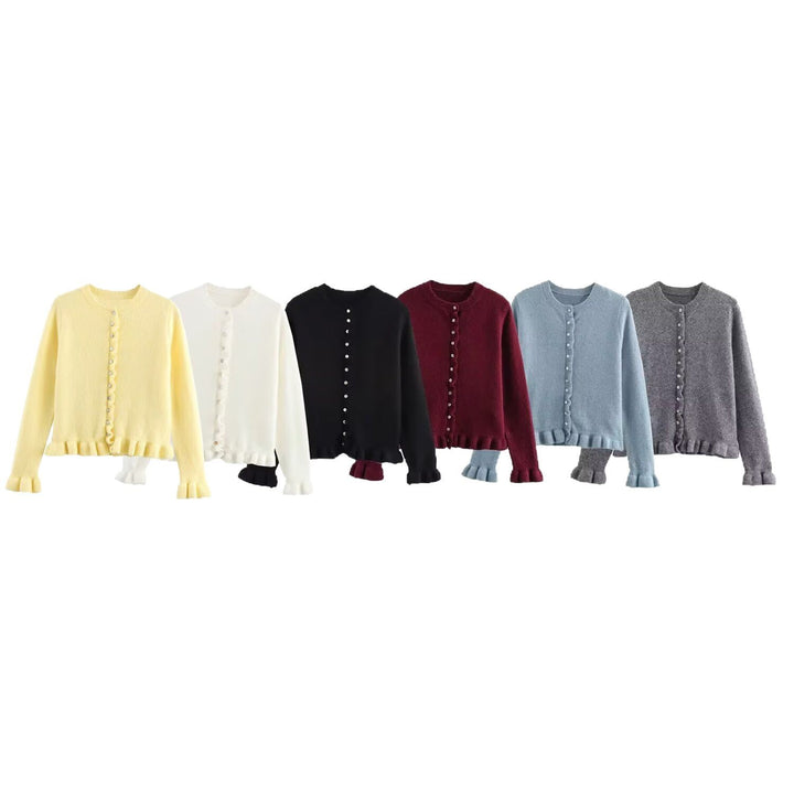 Women knitted vest with decorative ruffle trim and button closure Lune London