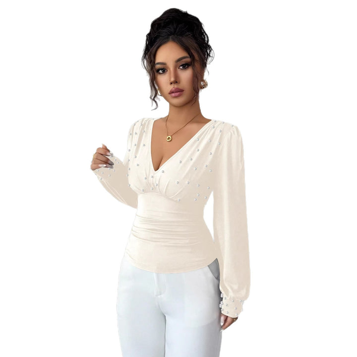 Chemisier élégant pour femmes avec décolleté en V et décoration Chic & Stil