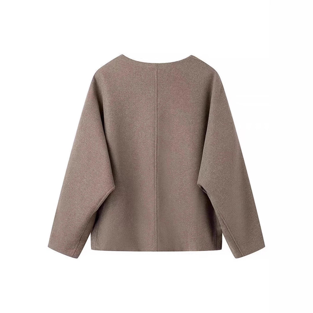 Modern women oversized jacket with elegant button closure treatment Lune London