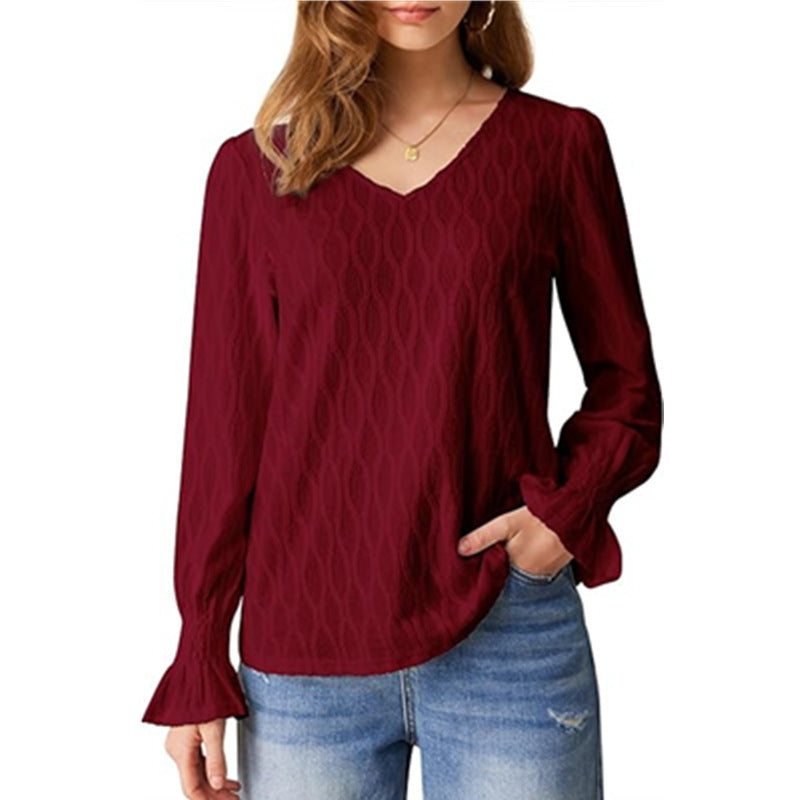 Elegant women's blouse with a V-neck and refined ruffle details Lune London