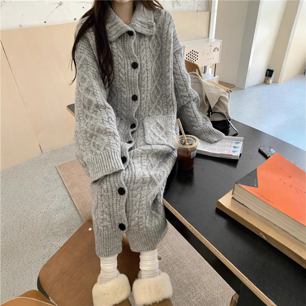Thick knit button coat for ladies with an elegant cable pattern and practical pockets Lune London