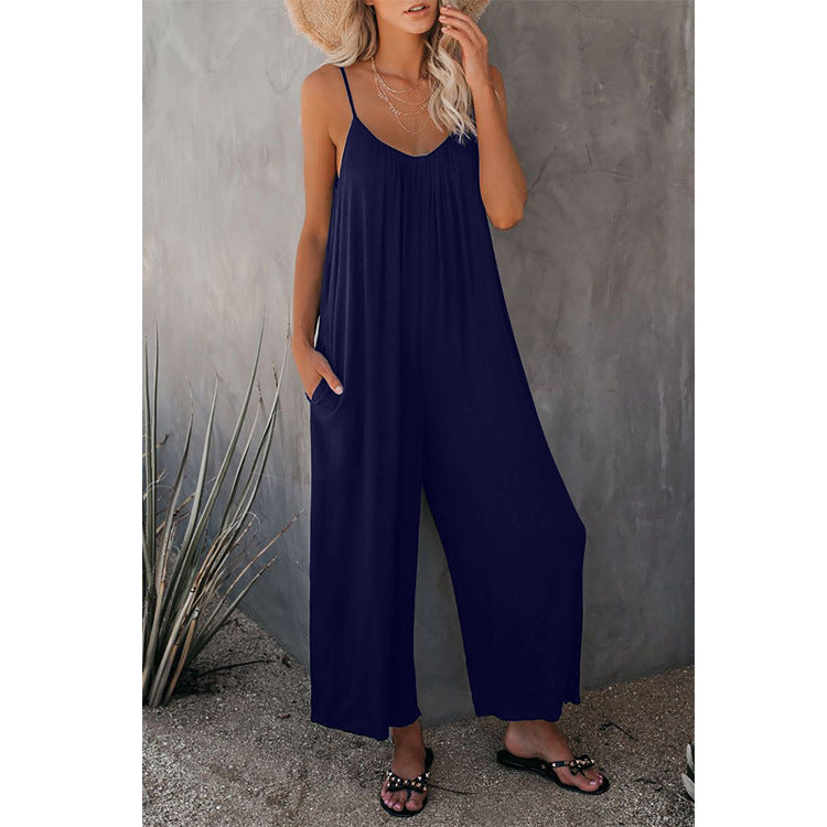 Casual summer jumpsuit for women with plunging neckline and practical pockets Lune London