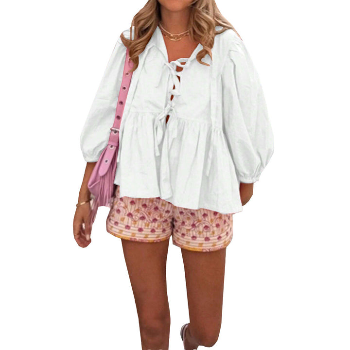 Blouse femme avec des détails de volants ludiques et une coupe décontractée Chic & Stil