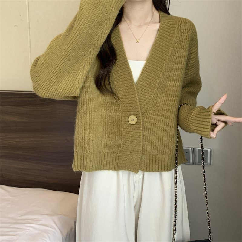 Cardigan tendance femme avec décolleté en V profond et fermeture à boutons Chic & Stil