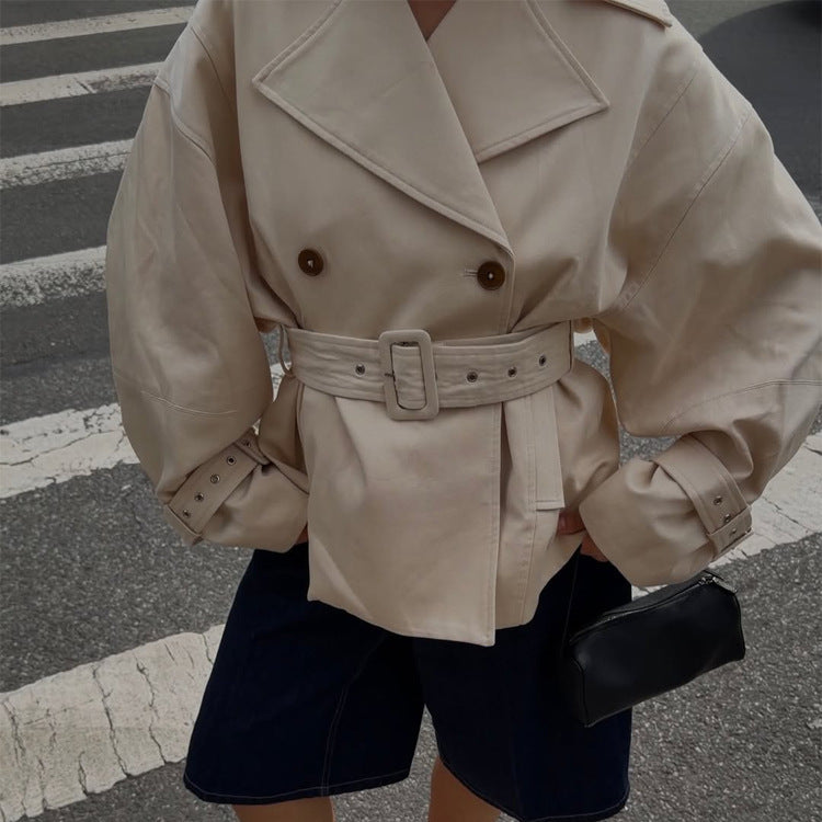 Ladies short trench coat with tailored belt, wide lapels and boxy silhouette Amarae