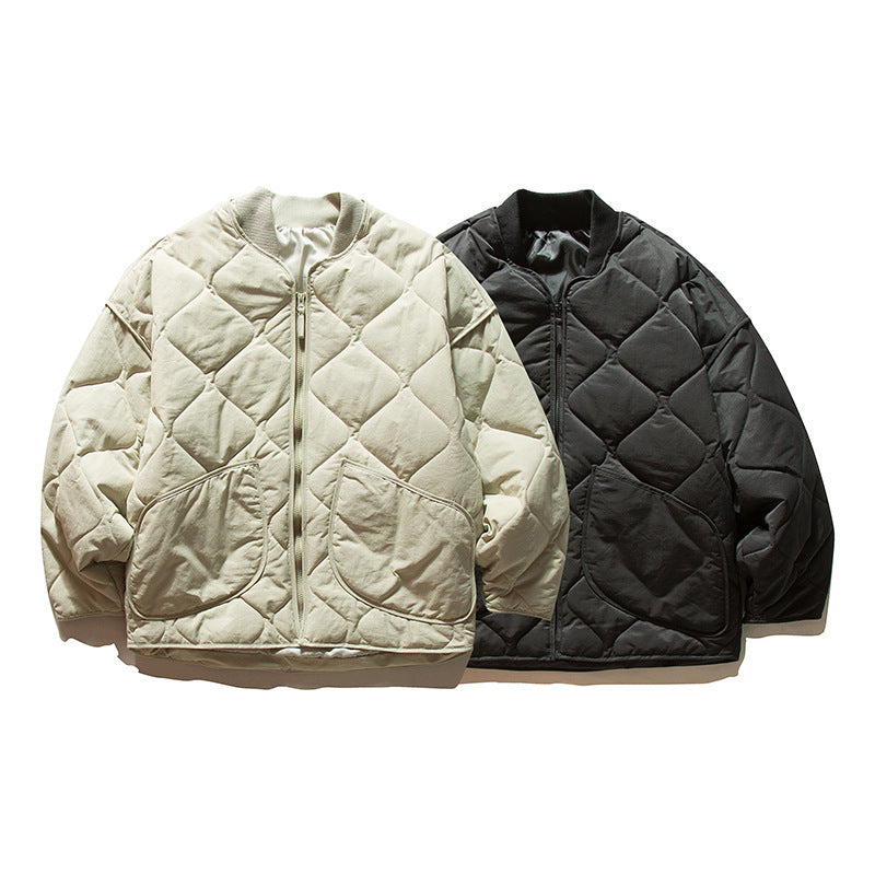 Unisex Lightweight Boxy Puffer Jacket with distinctive diamond quilting, front round pockets, and ribbed collar Amarae