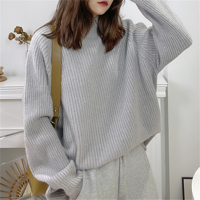 Oversized knitted sweater for women with high collar and fine ribbed structure Lune London