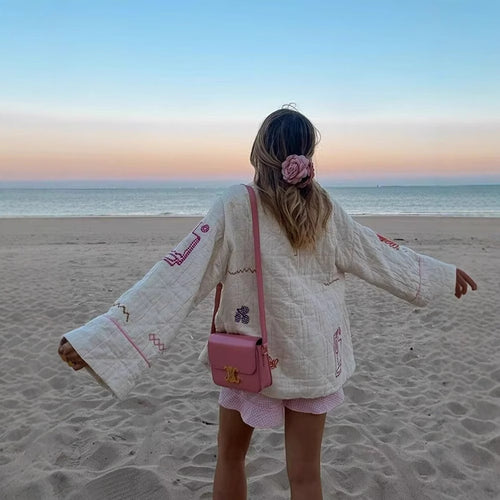Women's kimono jacket with decorative embroidery design and practical pockets Amarae