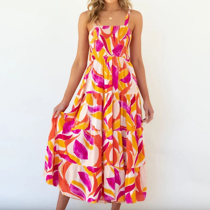 Maxi dress inspired by boho for women with colorful floral pattern and elastic top Chic & Stil