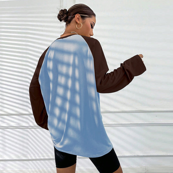 T-shirt à manches longues pour femmes avec coupe raglan sportif et design color block tendance Chic & Stil