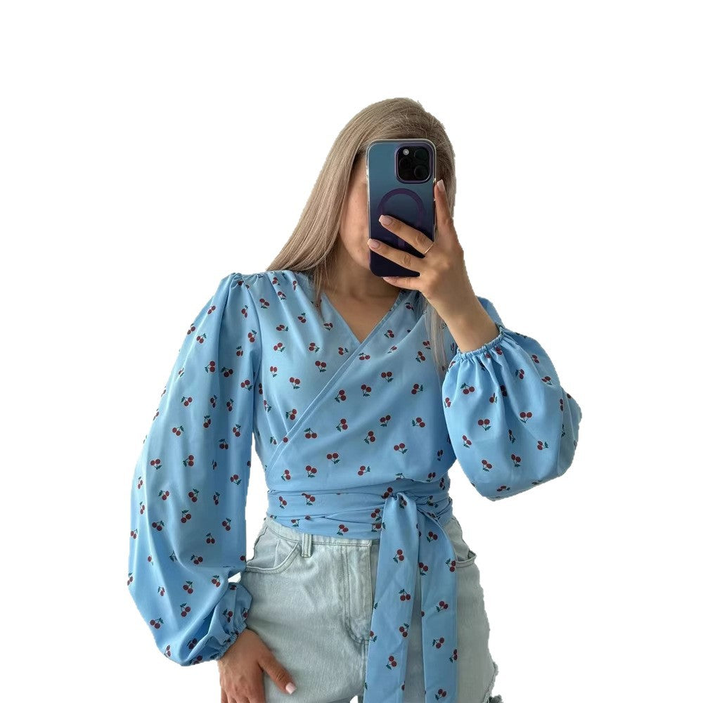 Women's wrap blouse with cherry print, wide puff sleeves & tie belt Amarae