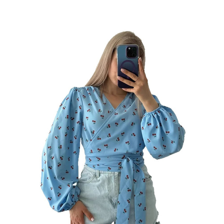 Women's wrap blouse with cherry print, wide puff sleeves & tie belt Amarae