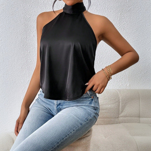 Elegant women's top with backless design and silky finish Chic & Stil