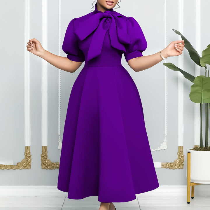 Midi dress for women with an elegant bow and puff sleeves Lune London