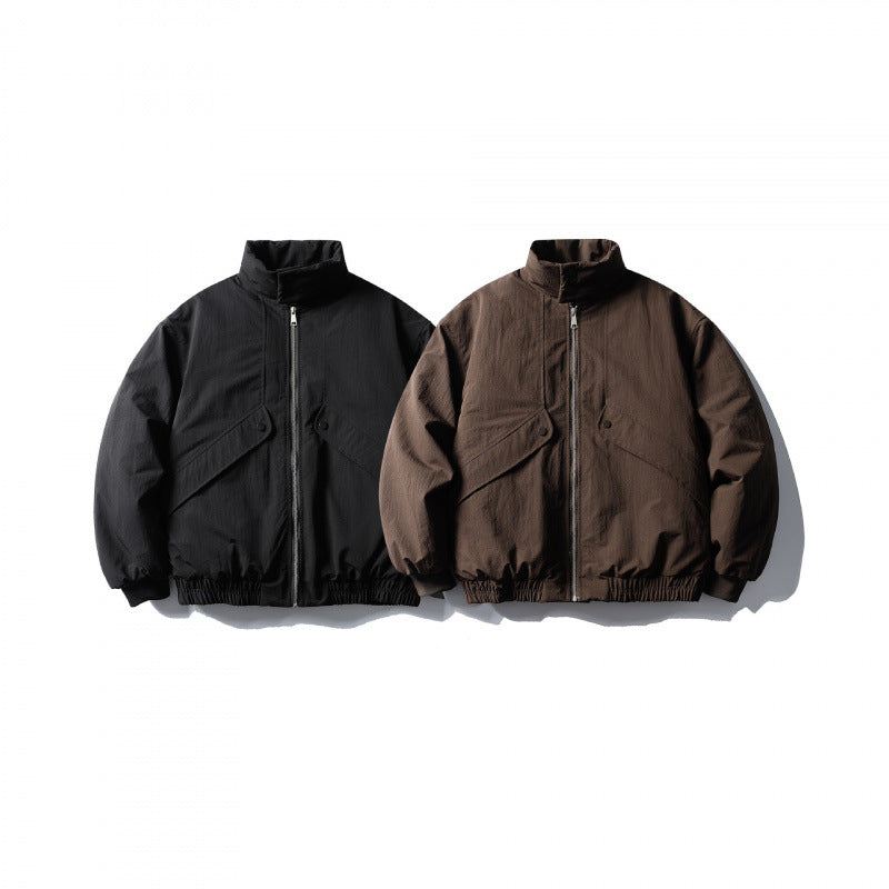 Unisex short boxy isolation jacket with diagonal flap pocket detail and elastic hem Amarae