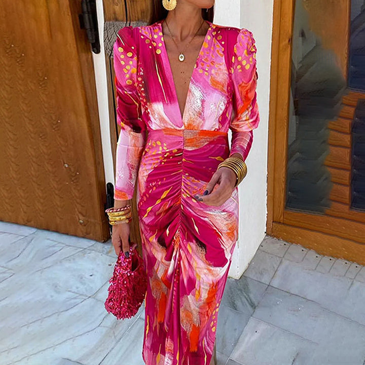 Robe maxi pour femmes avec un élégant décolleté en V et des manches bouffantes luxueuses Chic & Stil