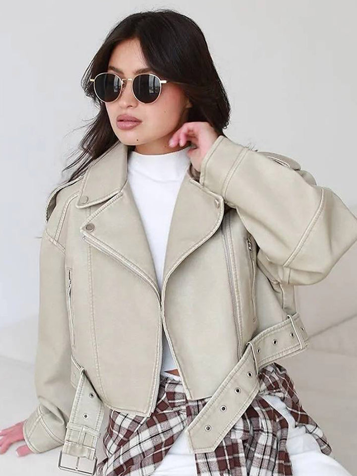 Women's short biker jacket made of vegan leather with a wide waist belt and visible decorative stitching Amarae