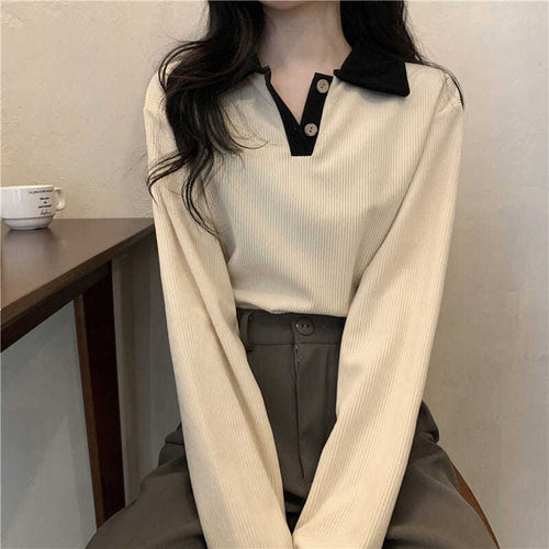 Women’s long-sleeve shirt with structured ribbed look and classic polo collar