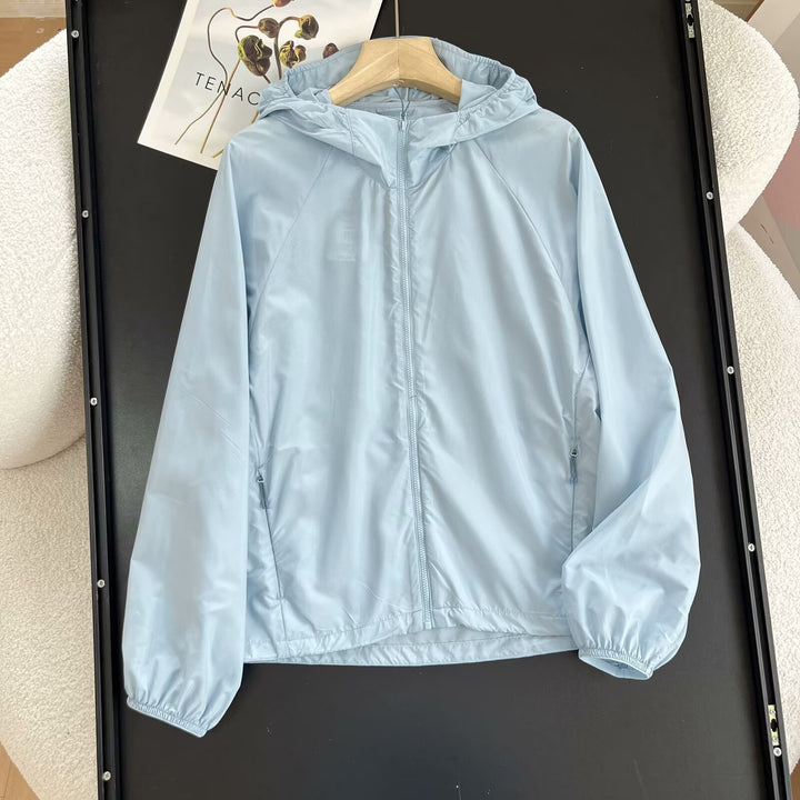 Veste de transition femme coupe-vent avec col à capuche ajustable Chic & Stil