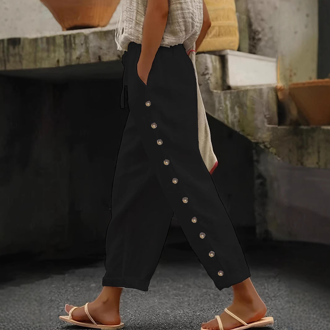 Wide trousers for women with button details on the sides and elastic waist Lune London