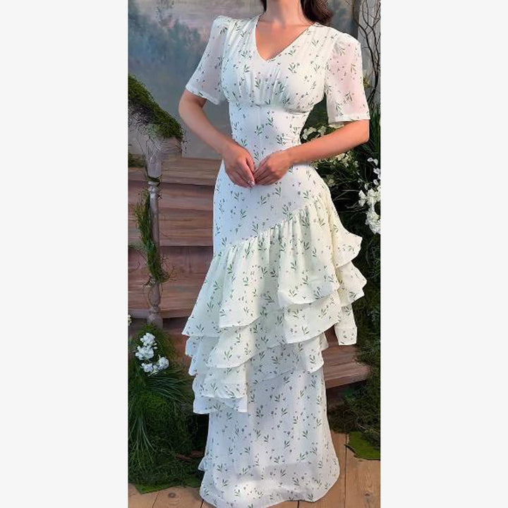 Women’s maxi dress in vintage-romantic style with asymmetric ruffles and puff sleeves Amarae