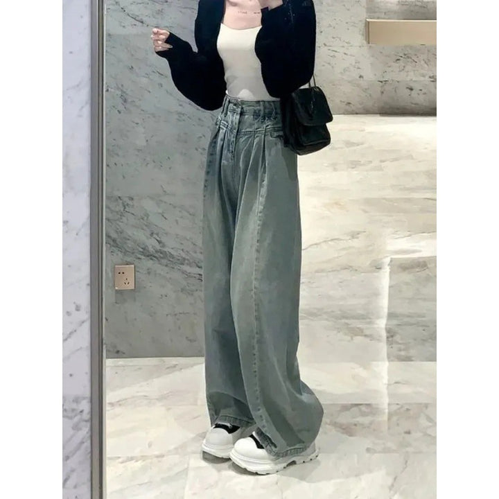 Jeans femmes taille haute à coupe large avec un design de ceinture élégant Chic & Stil