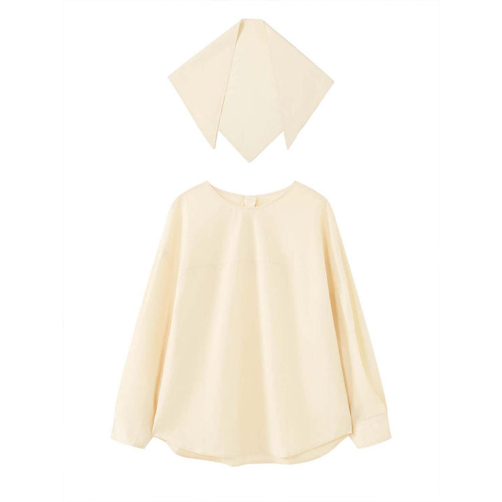 Women loosely cut cotton blouse with wrapped shawl collar and wide cuffs