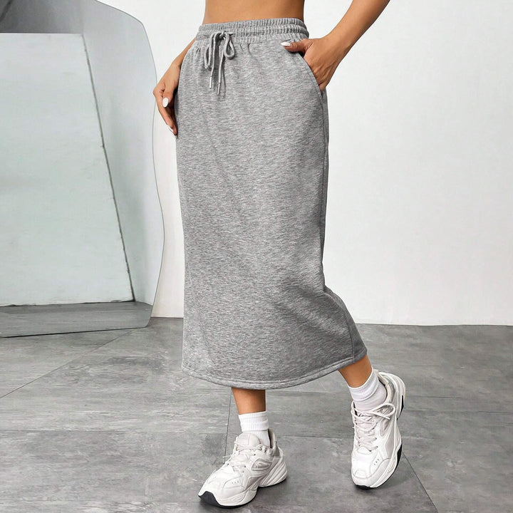 Midi jersey skirt for women with elastic waistband and welt pockets Lune London