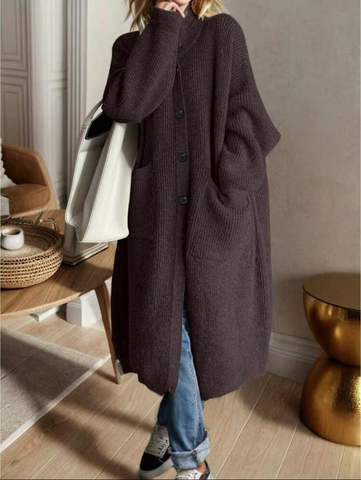Trendy knitted jacket for women with generous pockets and chic button detail