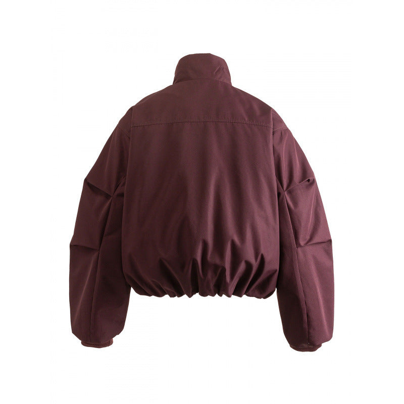 Unisex Boxy quilted bomber jacket with high stand-up collar and flap pockets Amarae