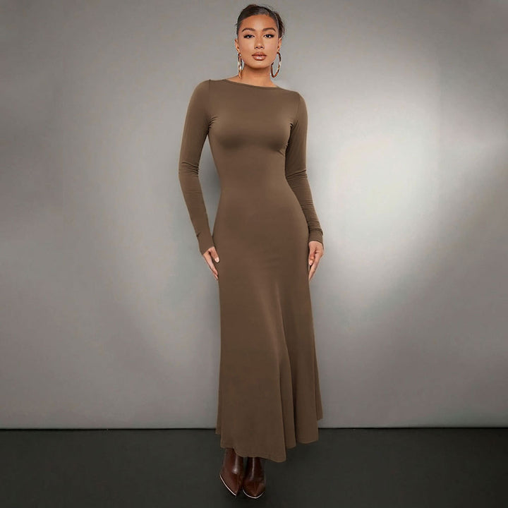 Robe midi à manches longues pour femmes avec un élégant col rond et un ourlet flottant Chic & Stil