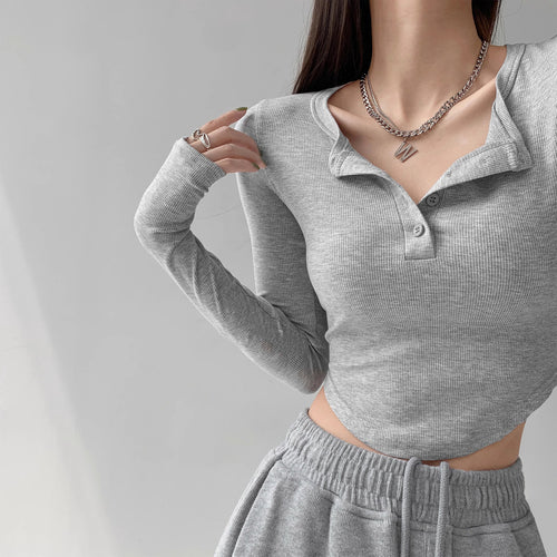 Women's long sleeve shirt with decorative button design and casual fit