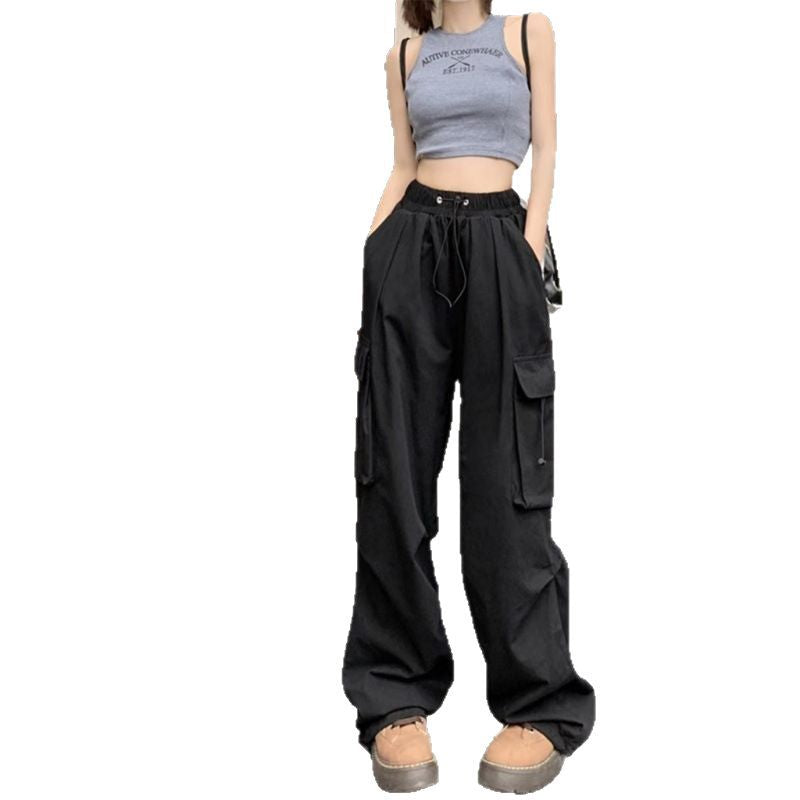 Women's cargo trousers with side pockets and elastic waistband Chic & Stil