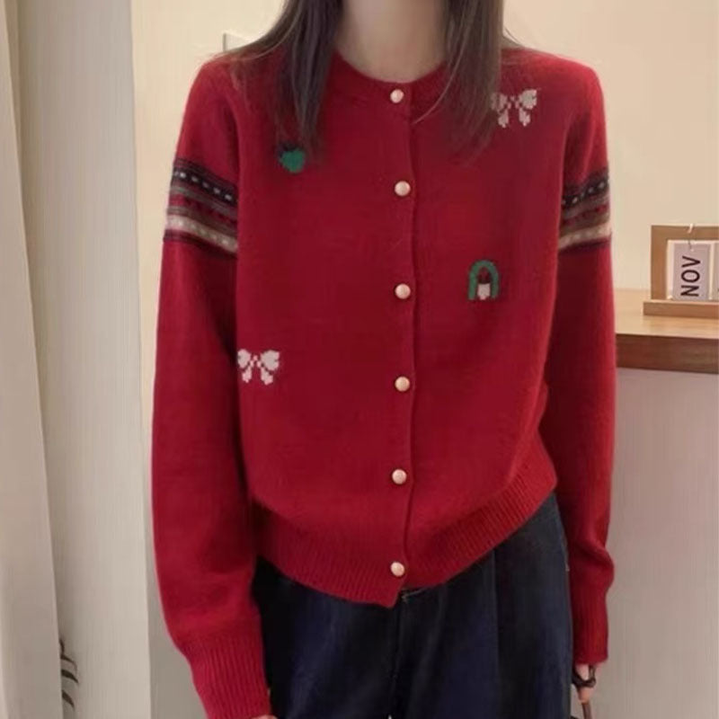 Knitted jacket for women with elegant appliqués and chic and stylish button details