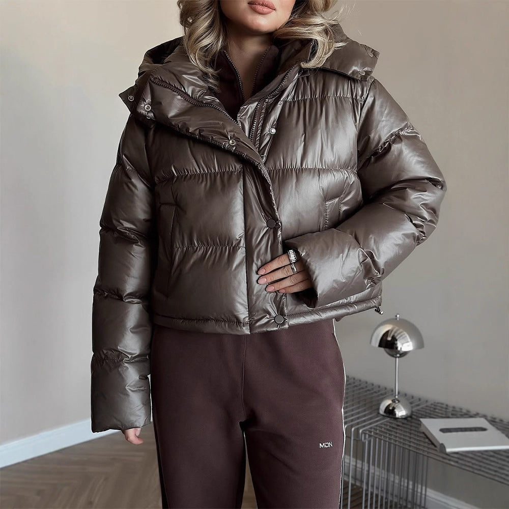 Women's short-cut shiny quilted jacket with high stand-up collar and snap-button placket Amarae