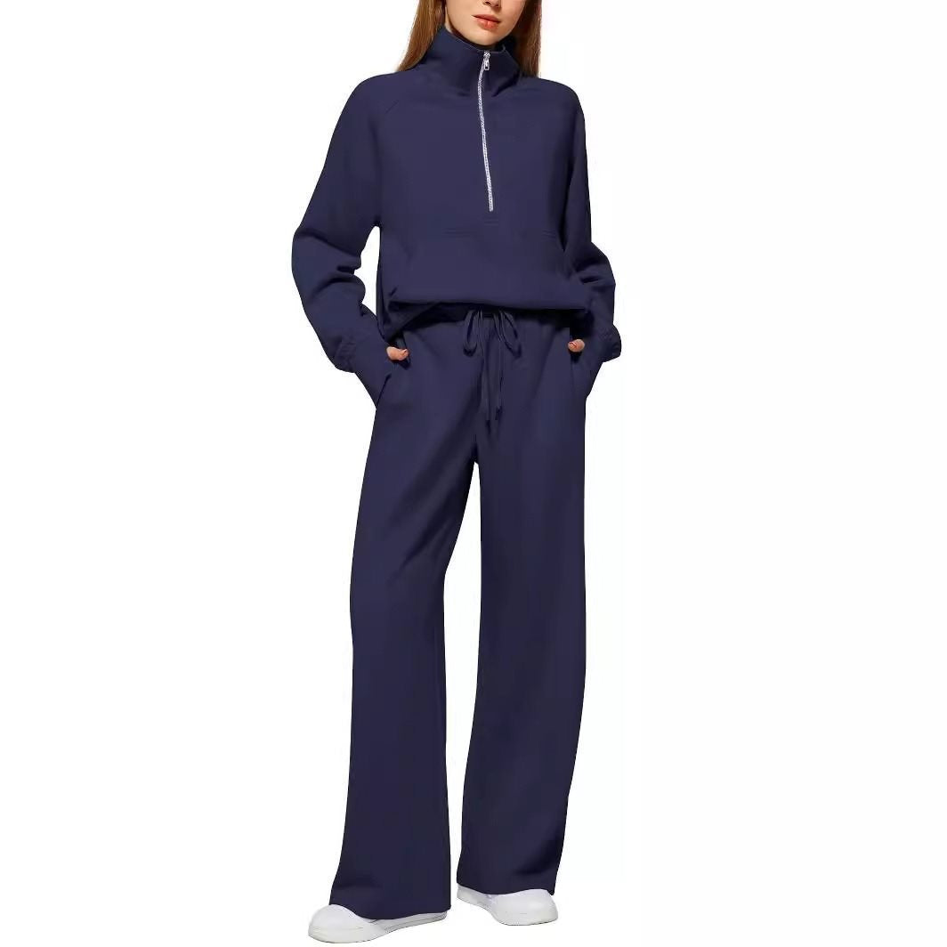 Women's sporty fleece jumpsuit set with high collar and side pockets Lune London