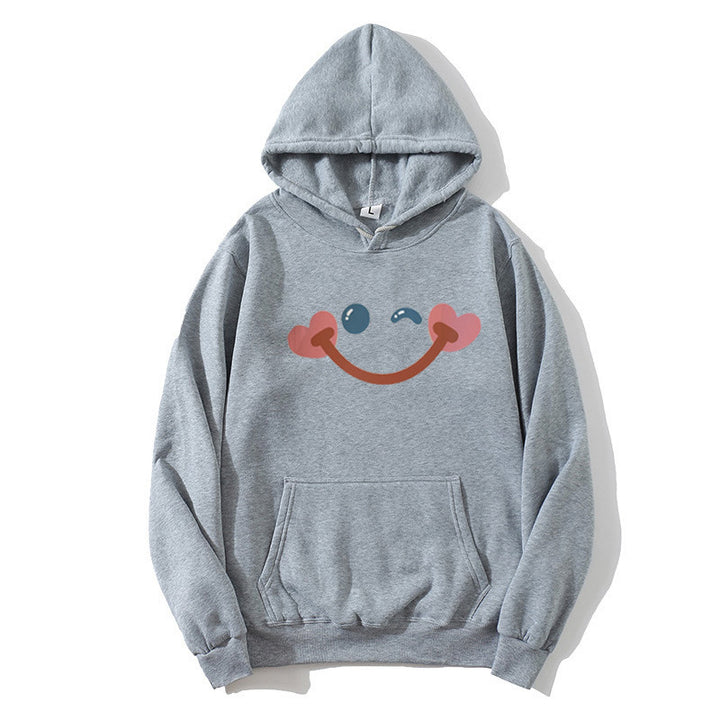 Women's hoodie with cheerful smiley design Chic & Stil