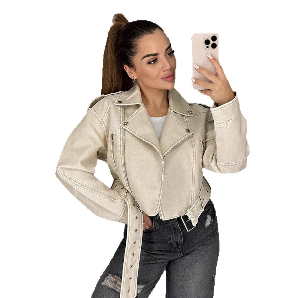 Women's short biker jacket made of vegan leather with a wide waist belt and visible decorative stitching Amarae