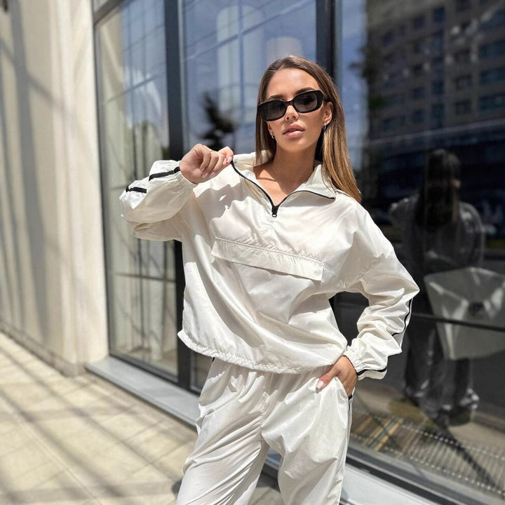 Ladies functional sports suit with high collar and elastic cuffs Lune London