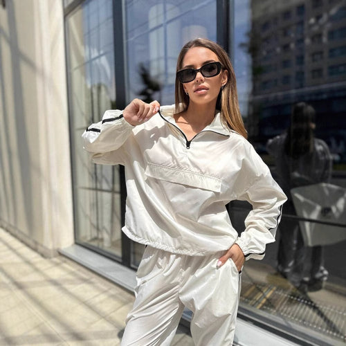 Ladies functional sports suit with high collar and elastic cuffs Amarae
