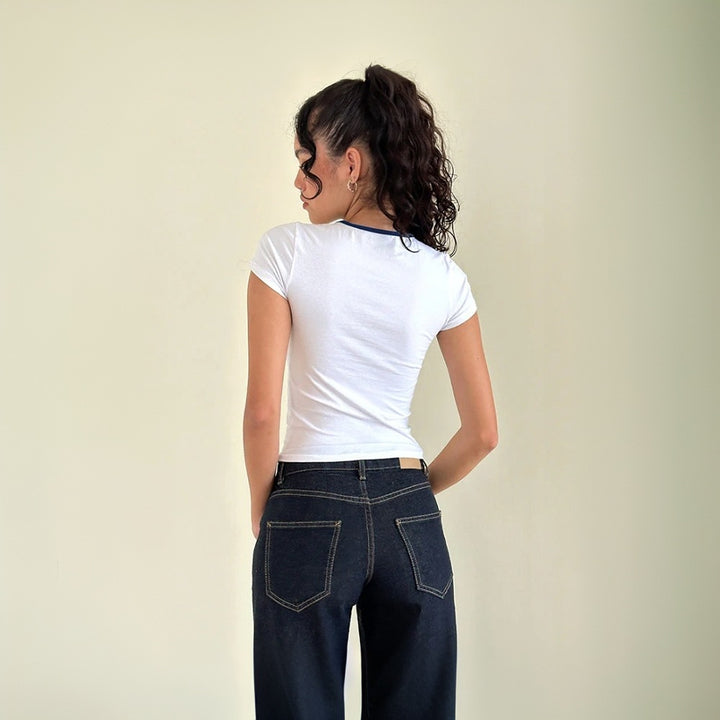 Short top for women with decorative keyhole neckline and elastic hem Chic & Stil
