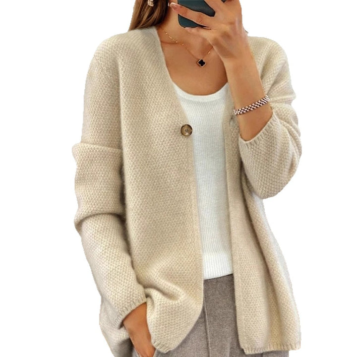 Women's knitted jacket with a fine textured pattern and a button detail Lune London