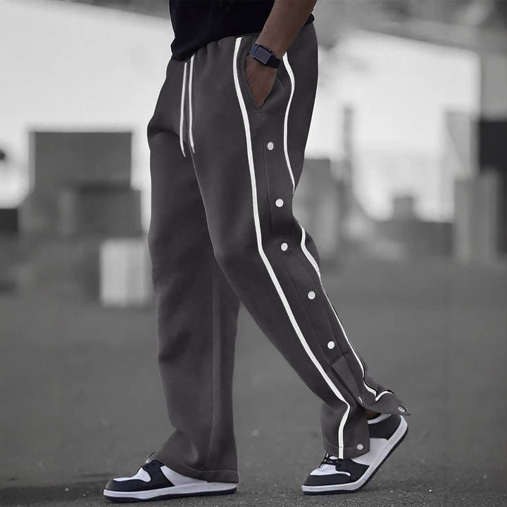 Stylish men's sports pants with snap button details and side pockets Lune London