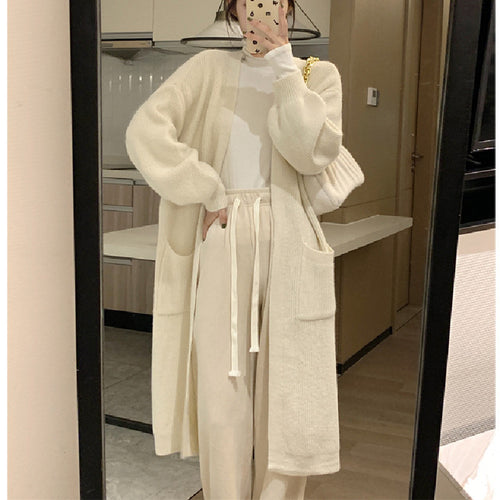 Ladies Long Knit Cardigan with practical pockets and chic elegant silhouette