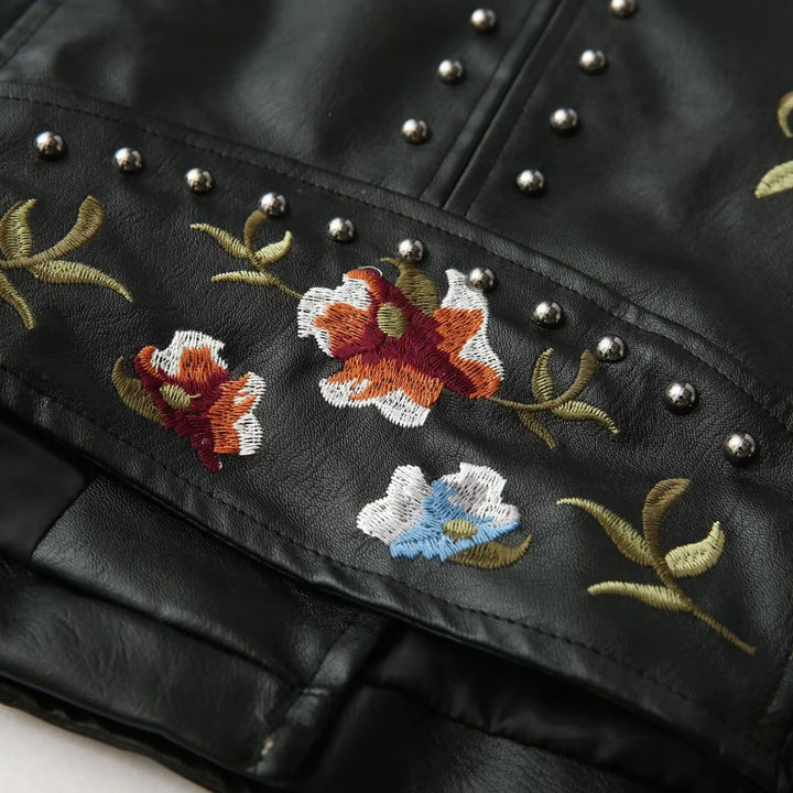 Biker jacket in faux leather for women with embroidered floral design and stud embellishments Lune London