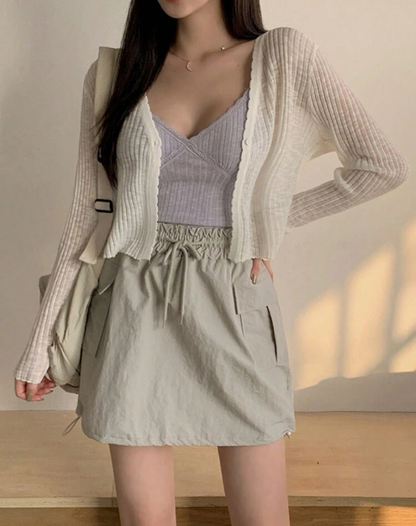 Womens playful cardigan with decorative details and a lightweight fabric Lune London