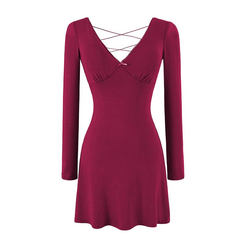 Ladies form-fitting mini dress with a deep V-neckline, gathered bust, and crossed back straps Amarae