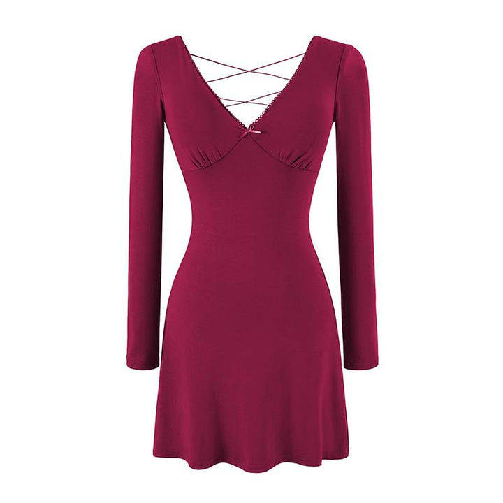 Ladies form-fitting mini dress with a deep V-neckline, gathered bust, and crossed back straps Amarae
